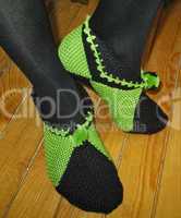 Hand knitted female slippers