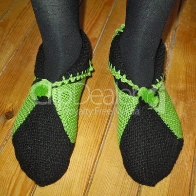 Hand knitted female slippers