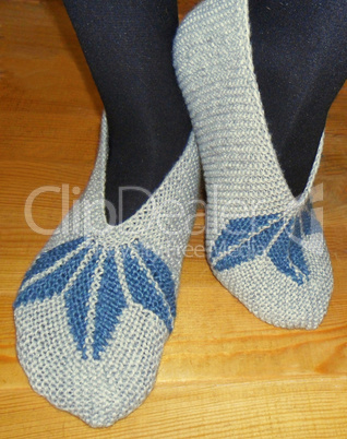 Hand knitted female slippers