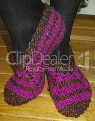 Hand knitted female slippers