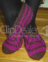 Hand knitted female slippers