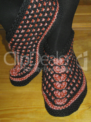 Hand knitted female slippers