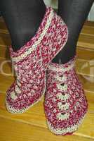 Hand knitted female slippers