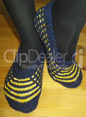 Hand knitted female slippers