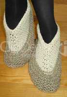 Hand knitted female slippers