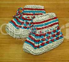 Hand knitted baby booties