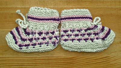 Hand knitted baby booties Hand knitted baby booties