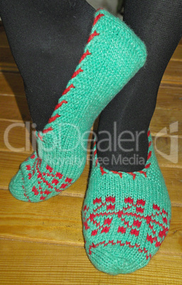 Hand knitted female slippers