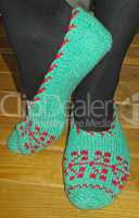 Hand knitted female slippers