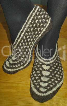 Hand knitted female slippers