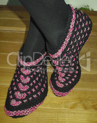 Hand knitted female slippers