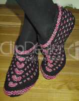 Hand knitted female slippers