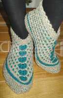 Hand knitted female slippers