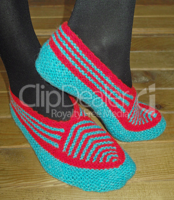 Hand knitted female slippers