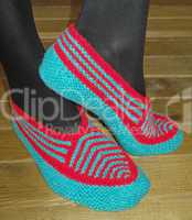 Hand knitted female slippers