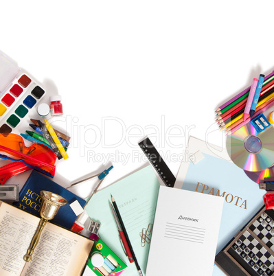 school supplies are scattered on a white sheet