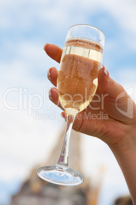 Bride holding a glass of champagne