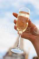 Bride holding a glass of champagne
