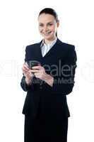 Corporate lady using mobile phone
