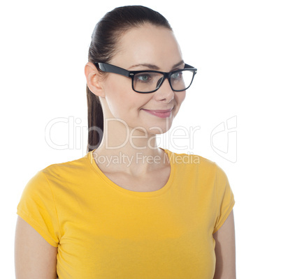 Beautiful young smiling woman in glasses