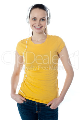 Beautiful woman listening music with headphones