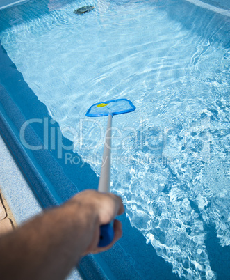 Man with Pool Skimmer
