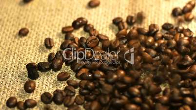 falling coffee beans fill the background