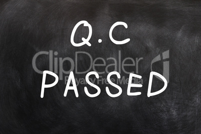 QC passed written on a chalkboard