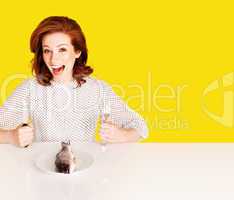 Studio shot of hungry woman on yellow background