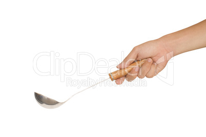 isolated hand holding a ladle or big spoon for soup
