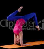 Woman exercise yoga asana - arm balance