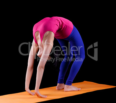 Woman exercise bridge yoga asana  on orange mat