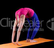 Woman exercise bridge yoga asana  on orange mat