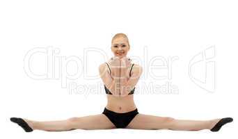 Beauty gymnast smile - doing split isolated