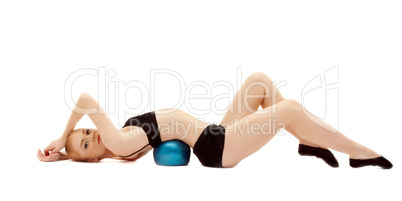 beauty girl in black cloth lay on gymnastic ball