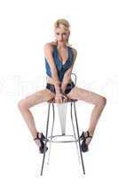 Beauty sexy woman posing on bar chair