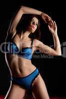 Beauty woman with perfect body in blue lingerie