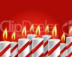 burning candle and shadow on red background