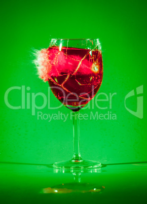 Glass with drink by bullet