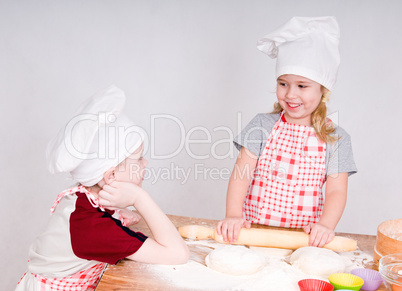 girl and boy  in chef's hats