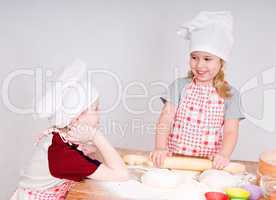 girl and boy  in chef's hats