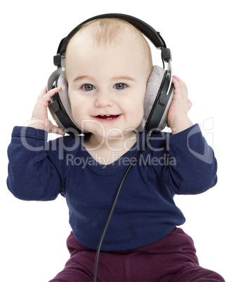 toddler with earphones