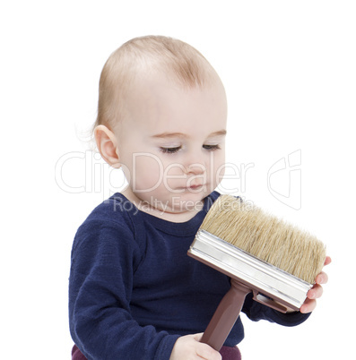 young child with brush