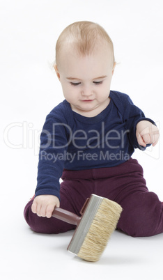 young child with brush