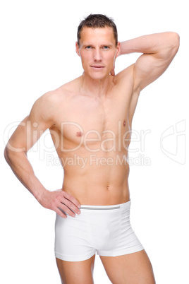Junger Mann in Unterwäsche