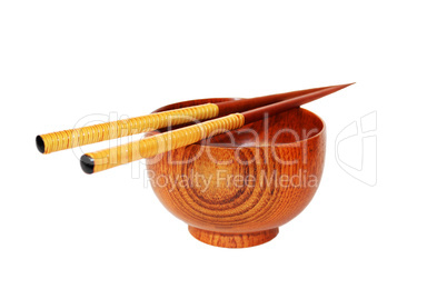 Chopsticks with wooden bowl isolated on white