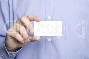 Business man holding blank card