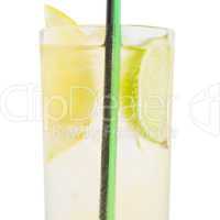 A delicious cocktail with slices of lemon and lime in a glass be