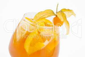 A delicious mix of orange and lemon in a glass beaker decorated