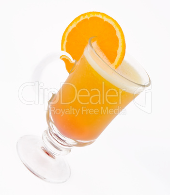 A delicious cocktail from orange juice in a glass beaker decorat